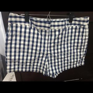 Blue gingham shorts.